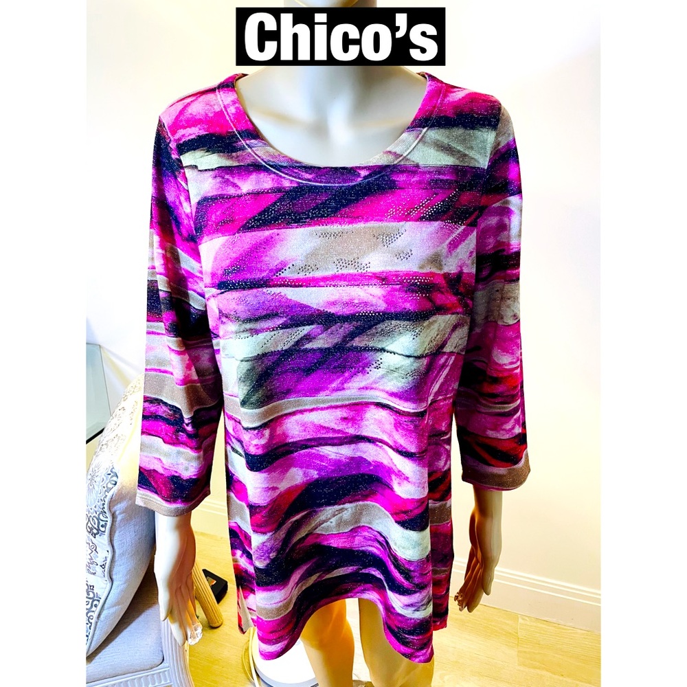 Chico’s, Glitter & Silver Studded with shark bite bottom Tunic is a Sz and 10-12